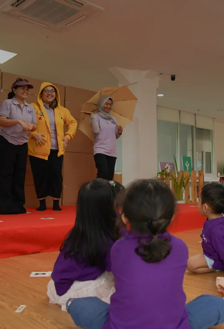 Focused child engaged in learning at Sky Preschool